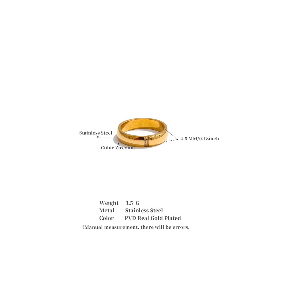 Cubic zirconia geometric ring in 18K gold-plated stainless steel with cubic zirconia.