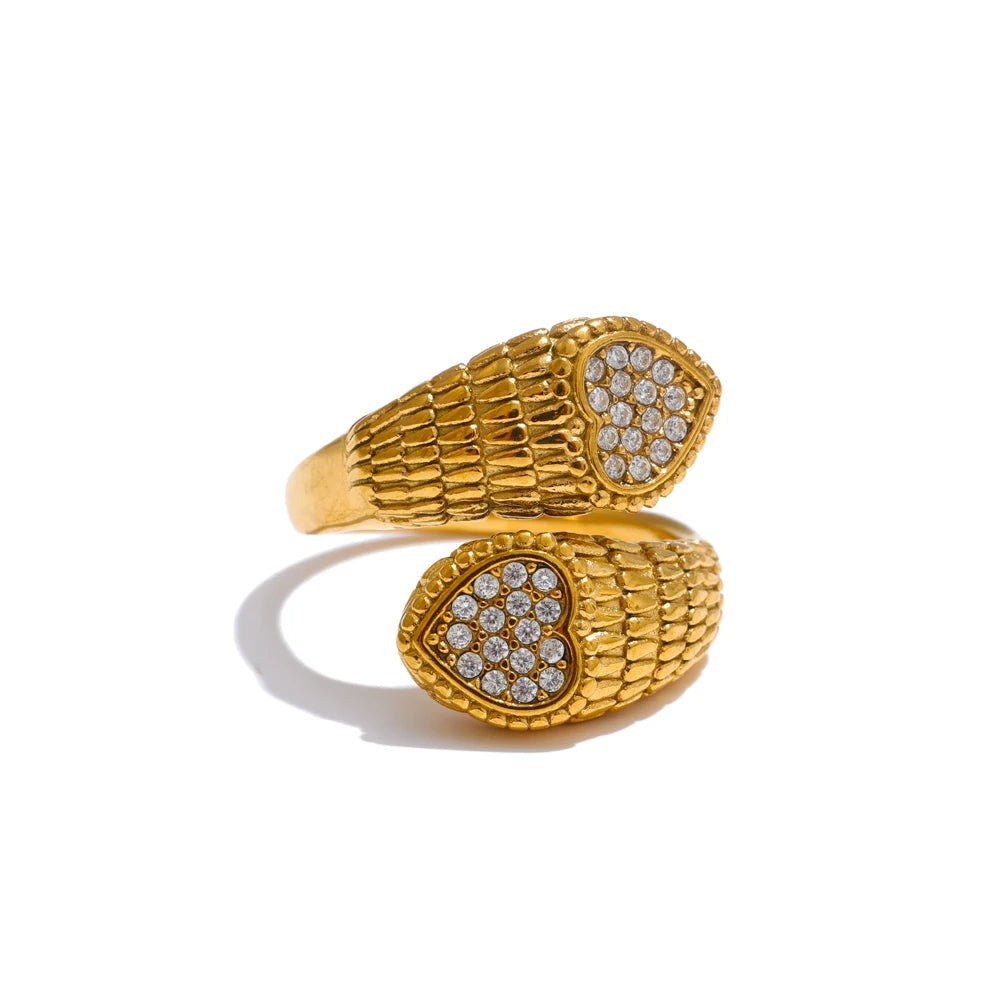 Gold-plated ring with cubic zirconia accents.