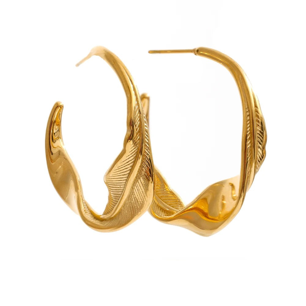 Gold-plated stainless steel earrings with a leaf design.