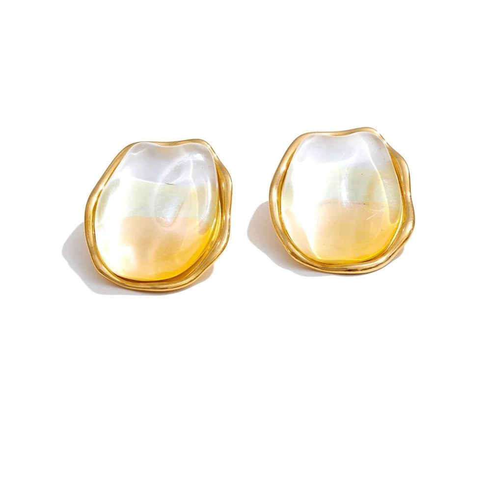 Gold-plated stainless steel earrings with resin.